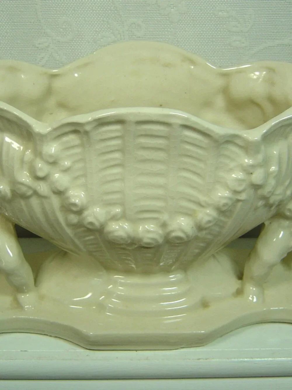 Vintage white planter/vase--cherubs beside a vase-5 1/4